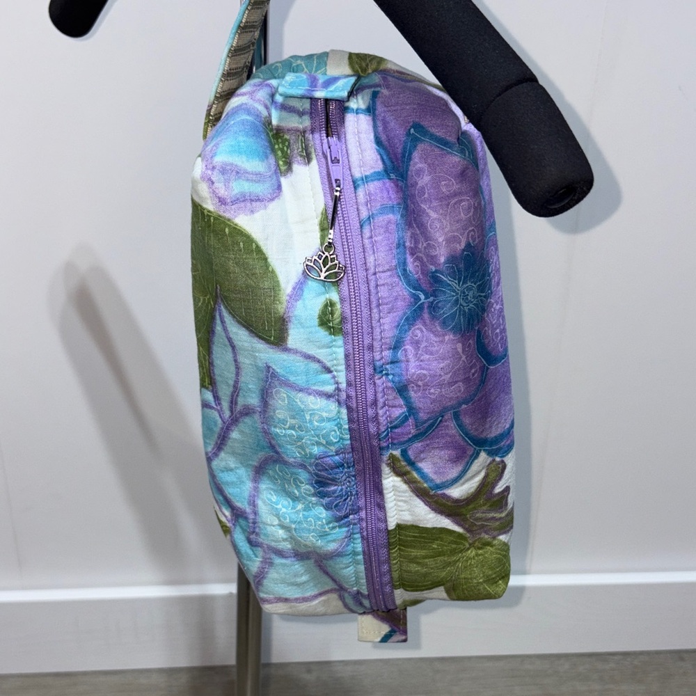 Traveling sanctuary sisterhood upcycled travel cosmetic floral bag
